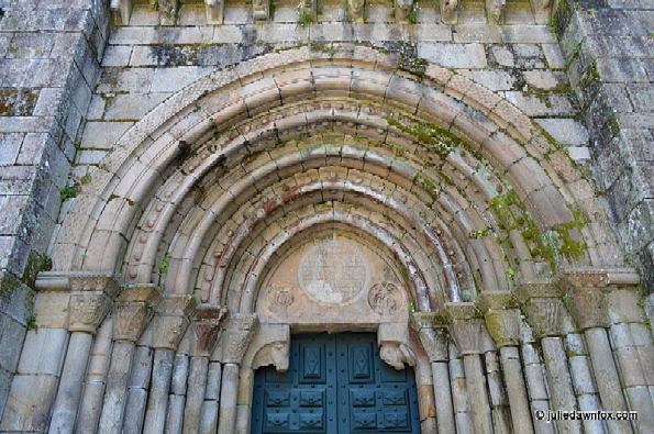 Portal, Paço de Sousa Monastery. The bull's head on the left corner of the door and the man's head at right, represent "strength and wisdom". 