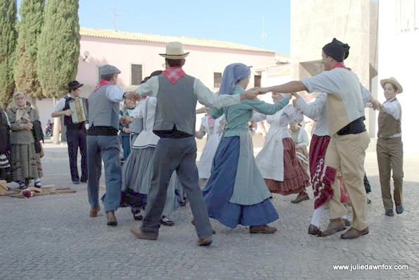 Dancing in clircles.  Folk dancing group in Loulé, Portugal.
